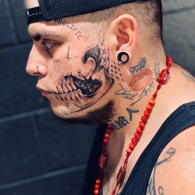 Black and grey skull face tattoo — WA Tattoo, Las Vegas