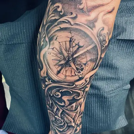 Black and grey ornate compass sleeve tattoo — WA Tattoo Las Vegas