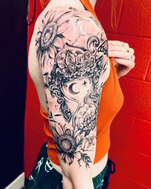 Black and grey sunflower half-sleeve tattoo — WA Tattoo, Las Vegas