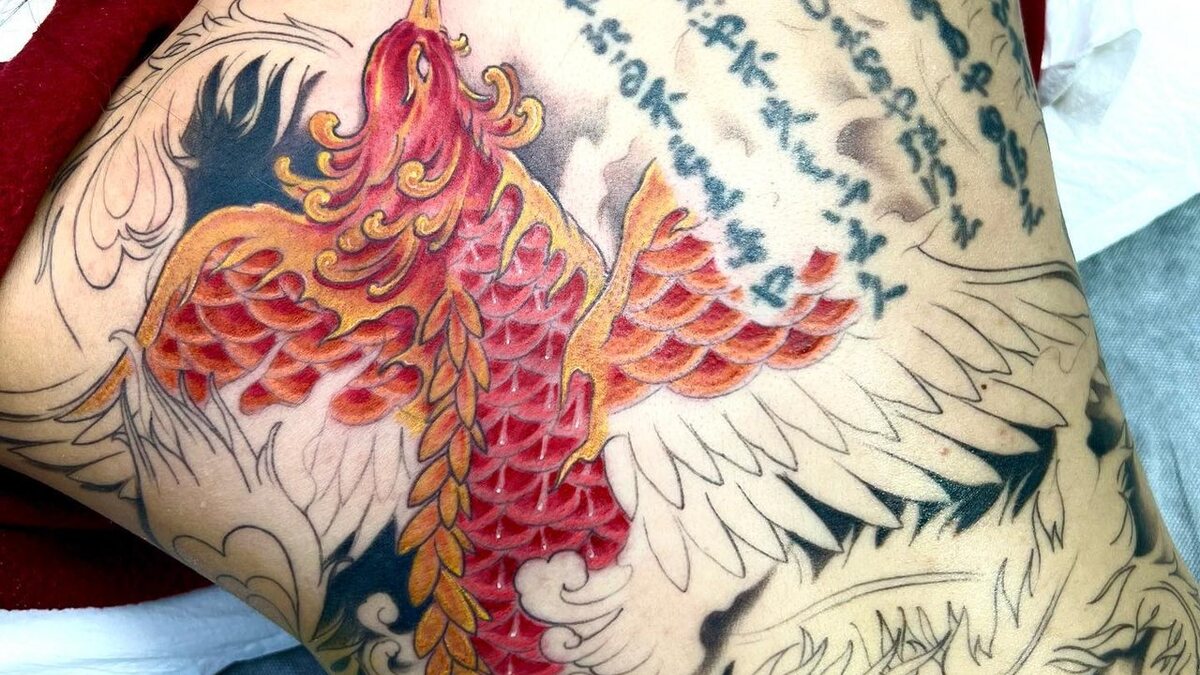 Red phoenix Japanese-style back tattoo — WA Tattoo, Las Vegas