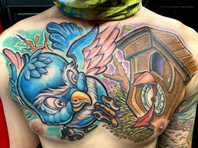 Full-color bird and geometric chest tattoo — WA Tattoo Las Vegas