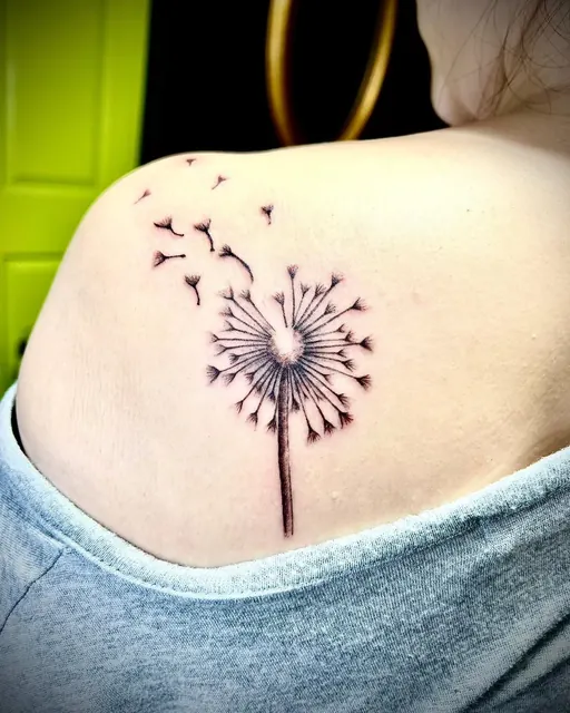 Fine-line dandelion shoulder tattoo — WA Tattoo, Las Vegas