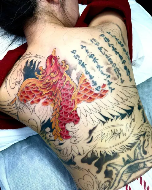 Red phoenix Japanese back tattoo — WA Tattoo Las Vegas